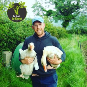 Jonny Hanson with geese on Jubilee Farm